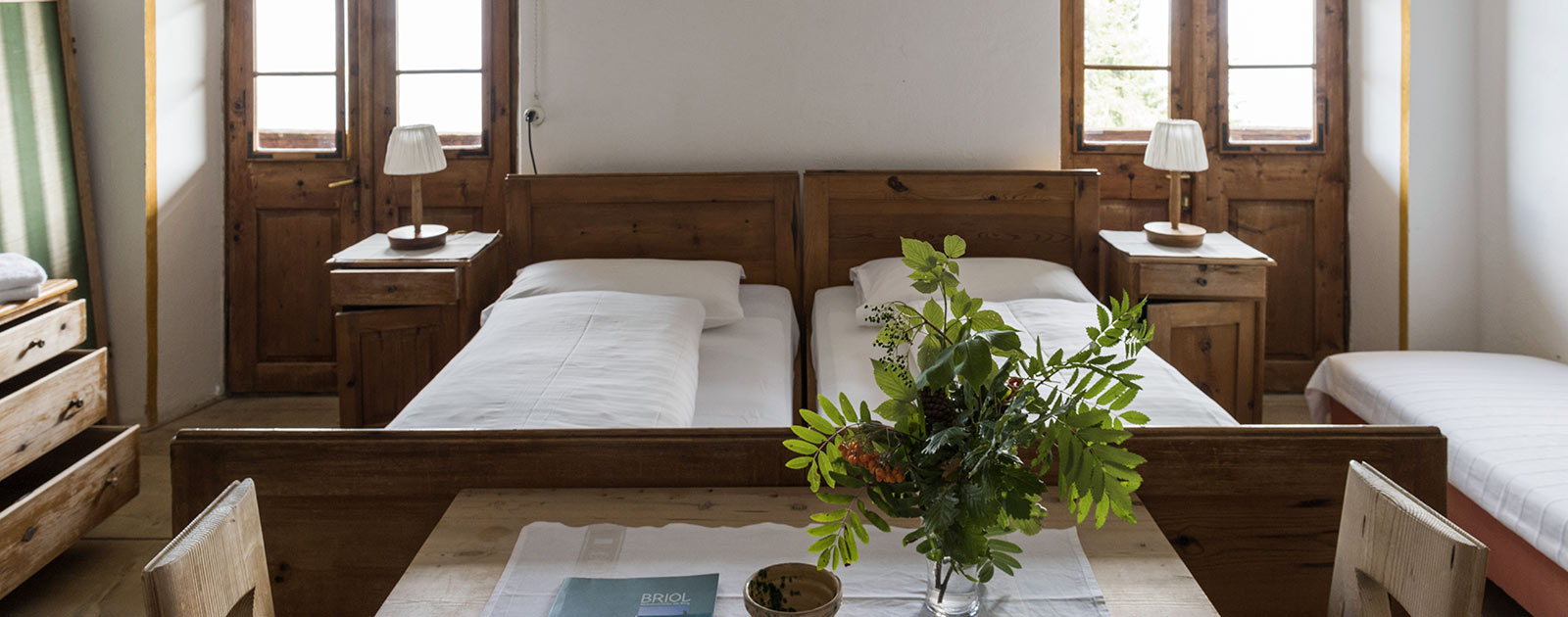 the beds in a room of Hotel Briol in Barbiano